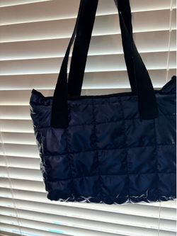 Metallic blue puffer purse