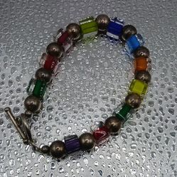 Vintage Multi colored square beads, sterling beads and clasp bracelet 