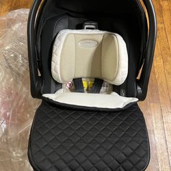 GRACO SnugRide SnugFit 35 Elite - Asiento infantil para automóvil, Nico