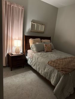 Queen size bed and side table