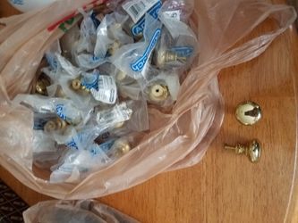 22 bright, solid brass pulls, new! Heavy.