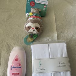 3 all new 2 pack lullaby crib sheets, Johnson baby lotion, and infantino music sloth plush