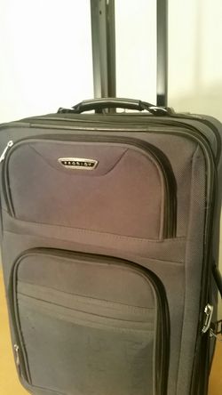 Luggage - black rolling medium size