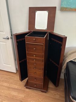 Tall Wood jewelry cabinet