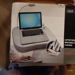 Laptop desk with built in cushion and light
