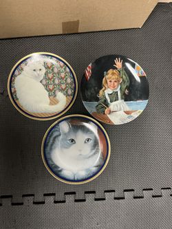 Three 8 inch collectible plates