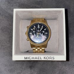 MICHAEL KORS MALE WATCH- GOLD WITH BLACK FACE- LINKS THAT WERE TAKEN OFF INCLUDED AS WELL AS THE BOX