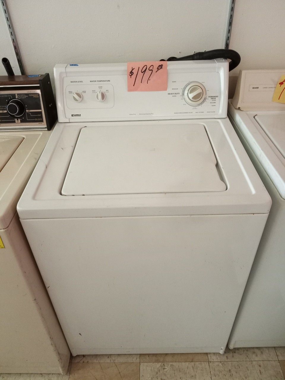 Kenmore Washing machine Washer white heavy duty ex large excellent . Warranty . Delivery available . 2203 Fowler st. Ft. Myers 33901