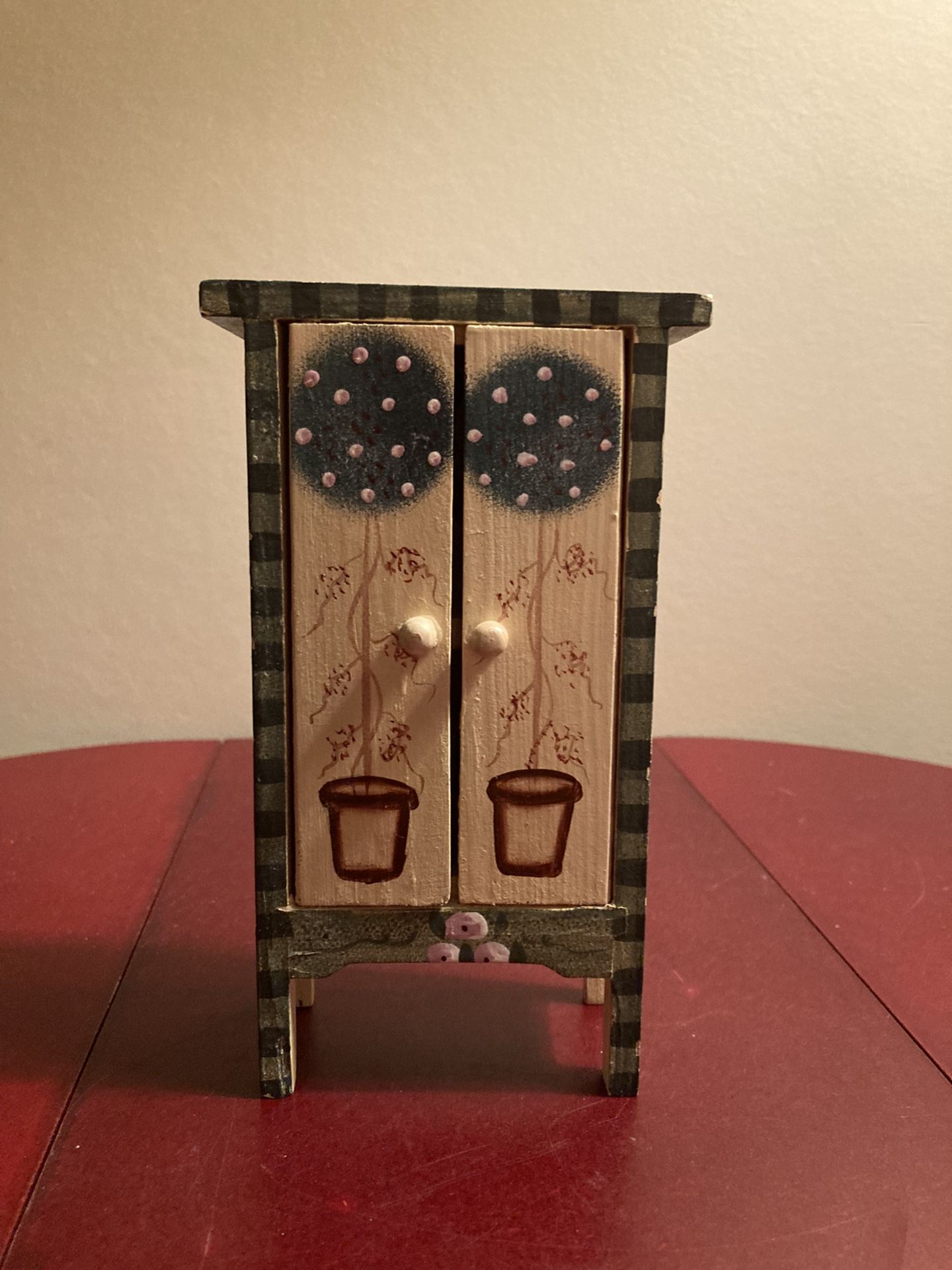 Cute Miniature Wooden Cabinet with Doors that Open