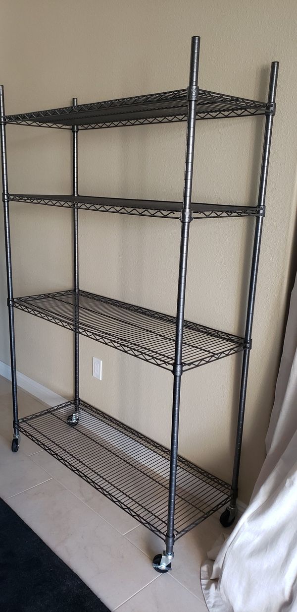 Big Metal Shelf with Weels 76" Tall X 48" Wide X 18" Deep 86.00 for