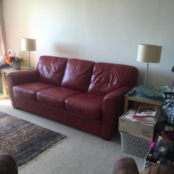 Red leather sleeper sofa, local delivery available