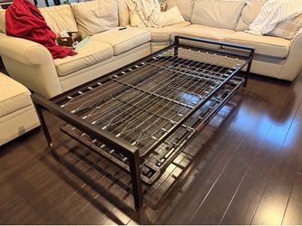 Metal Frame Twin Day Bed with Pop Up Trundle on Roller Wheels