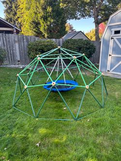 Jungle gym with swing