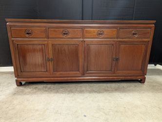 Rich Toned Wooden Sideboard with Carved Accents