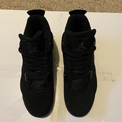 Black Cat Jordan 4’s