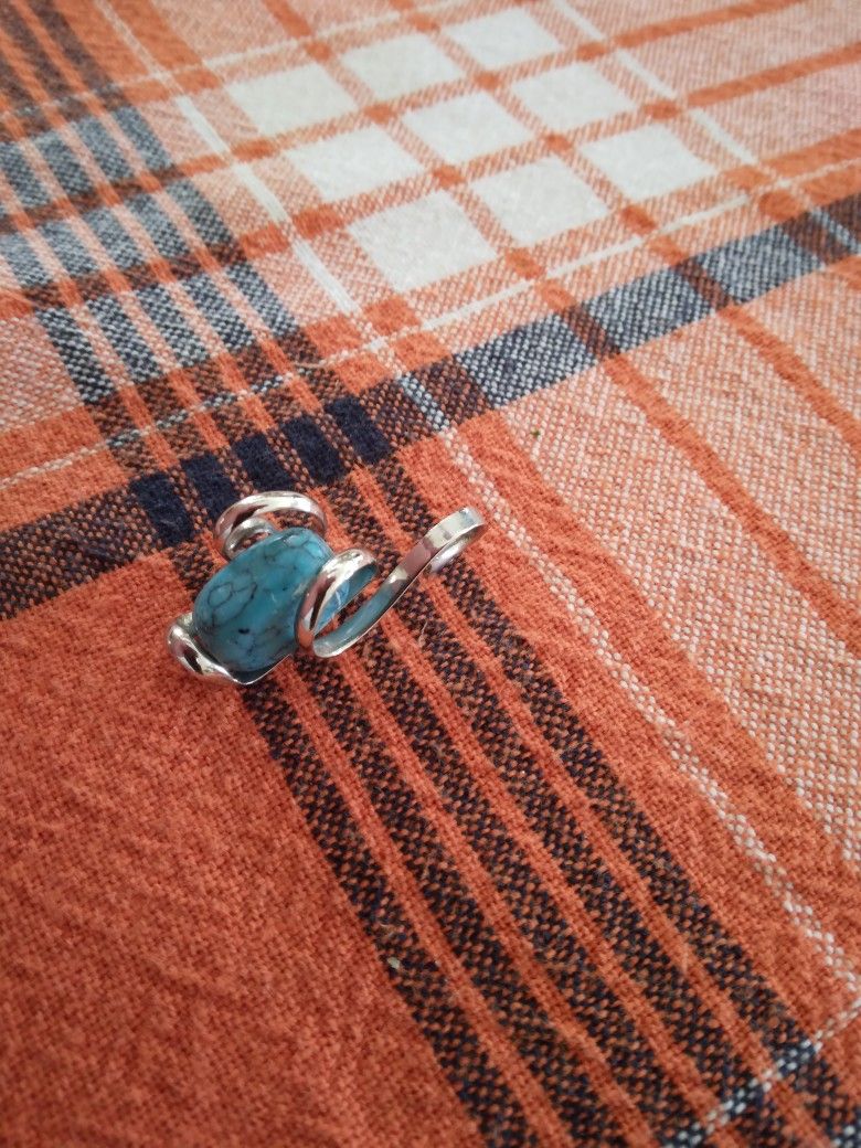 Silver And Turquoise Pendant.