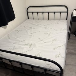 Queen size bed frame (Mattress not included) 