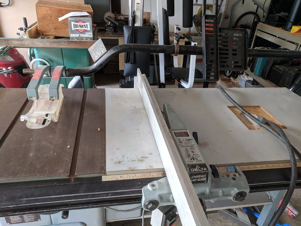 5 HP Delta Unisaw with Heavy Duty base, Long Extension Router Table and