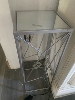 2 mirrored side tables