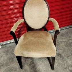2 Cushioned And Upholstered Arm Chairs $60