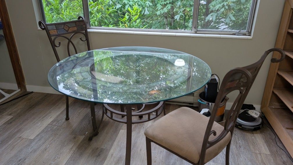Glass dining table with chairs