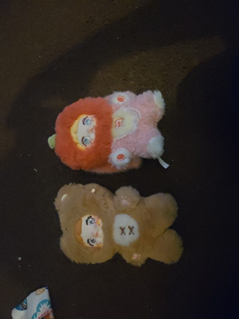 2 Nommi Brand Keychains