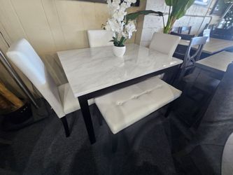 Brand new white faux marble (48"×32"×30"H) + 3 white faux leather chairs + 1 bench
