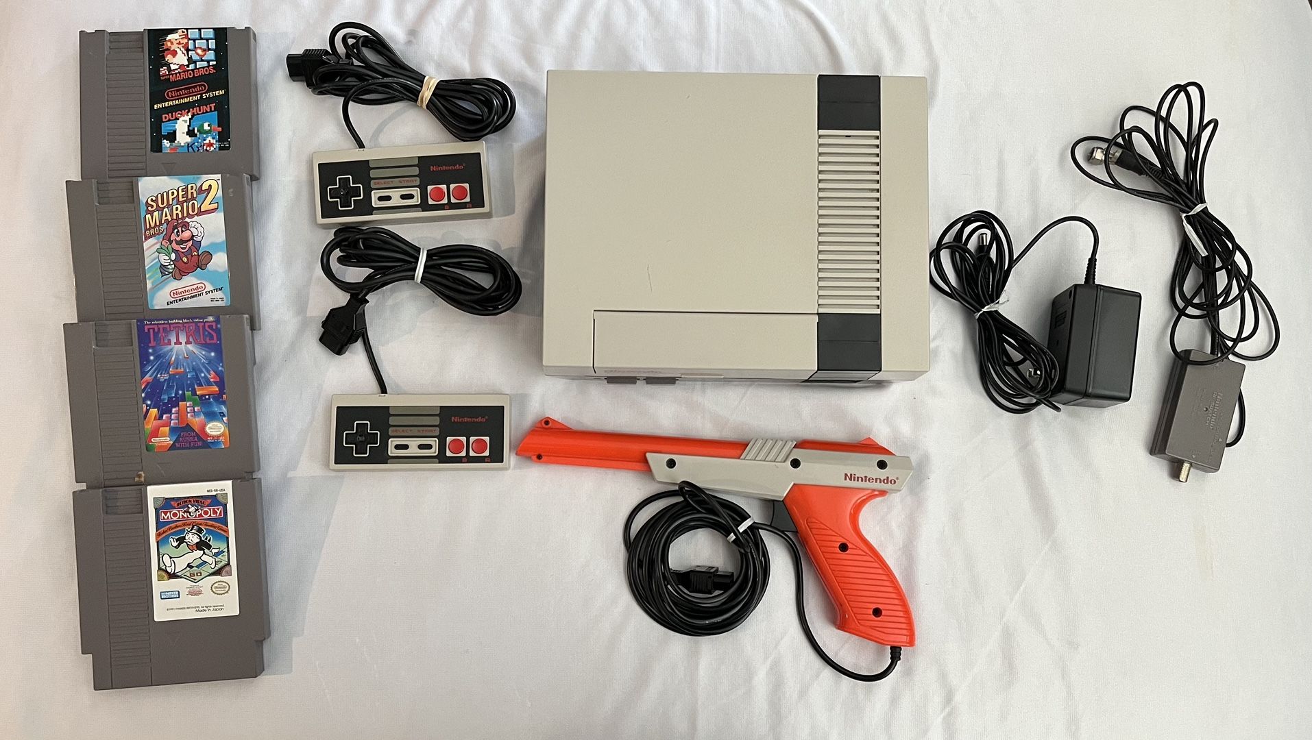 Nintendo NES Action Set W/ Controllers/ Zapper/ Games