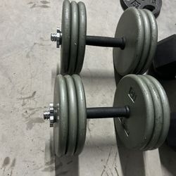 pair of 65lb adjustable dumbbells. 130lb in total 	