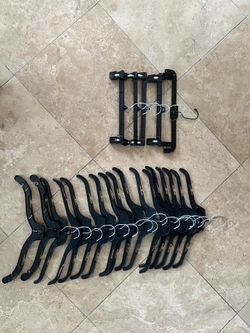 Assorted Black Plastic Clothing Hangers