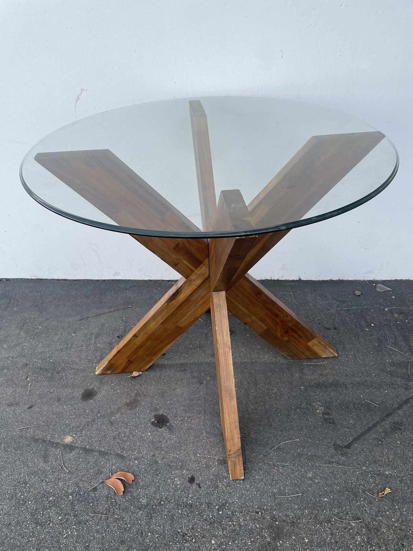 Used small roll wooden glass table no chairs