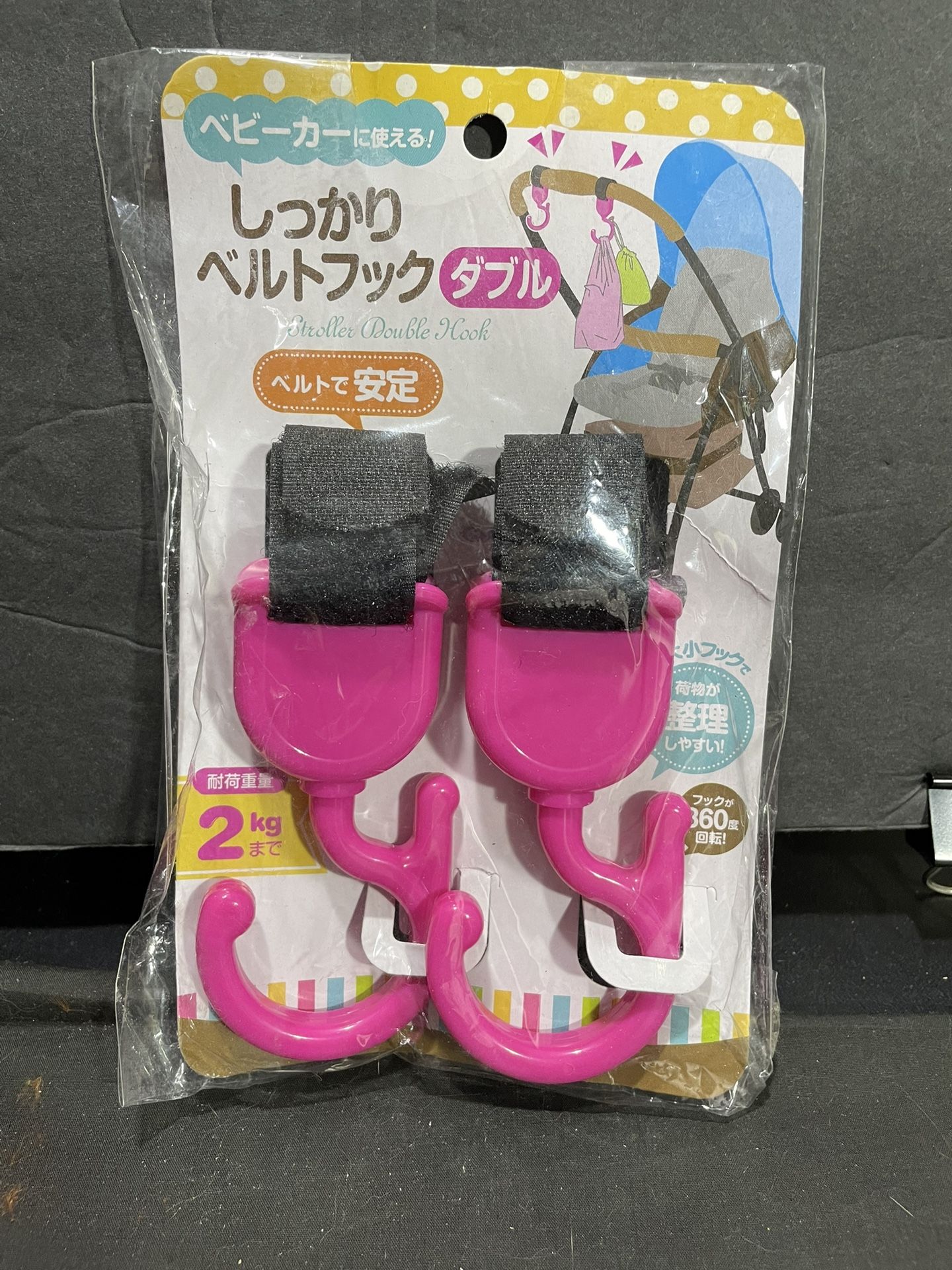 Brand new pink stroller clips… Hooks two in the package
