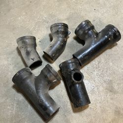 Five piece 4” cast-iron sewer fittings new