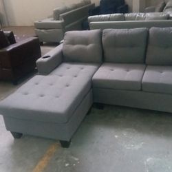 BRAND NEW SECTIONAL COUCH WITH CUP HOLDERS IN ORIGINAL BOX