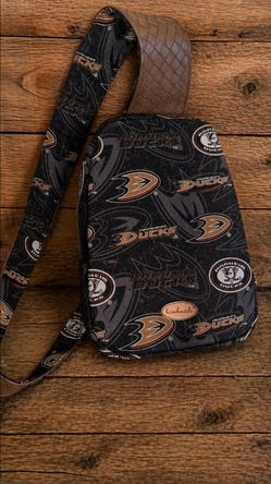 Anaheim Ducks crossbody sling backpack.