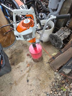 Stihl bt 45 powered with concrete bore drilling handle and dimond core bit