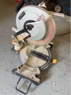 Compound miter saw