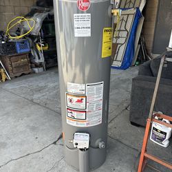 USED RHEEM 29 GALLON WATER HEATER WITH 3 YR WARRANTY