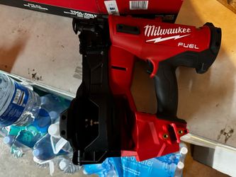 Powerful Milwaukee M18 FUEL coil roofing nailer. Tool is brushless, runs on 18-volt lithium-ion battery. Shoots 6 nails per second, 1,100 nails per ch