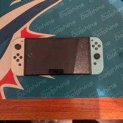 Nintendo Switch OLED (4 Games and Carrying Case