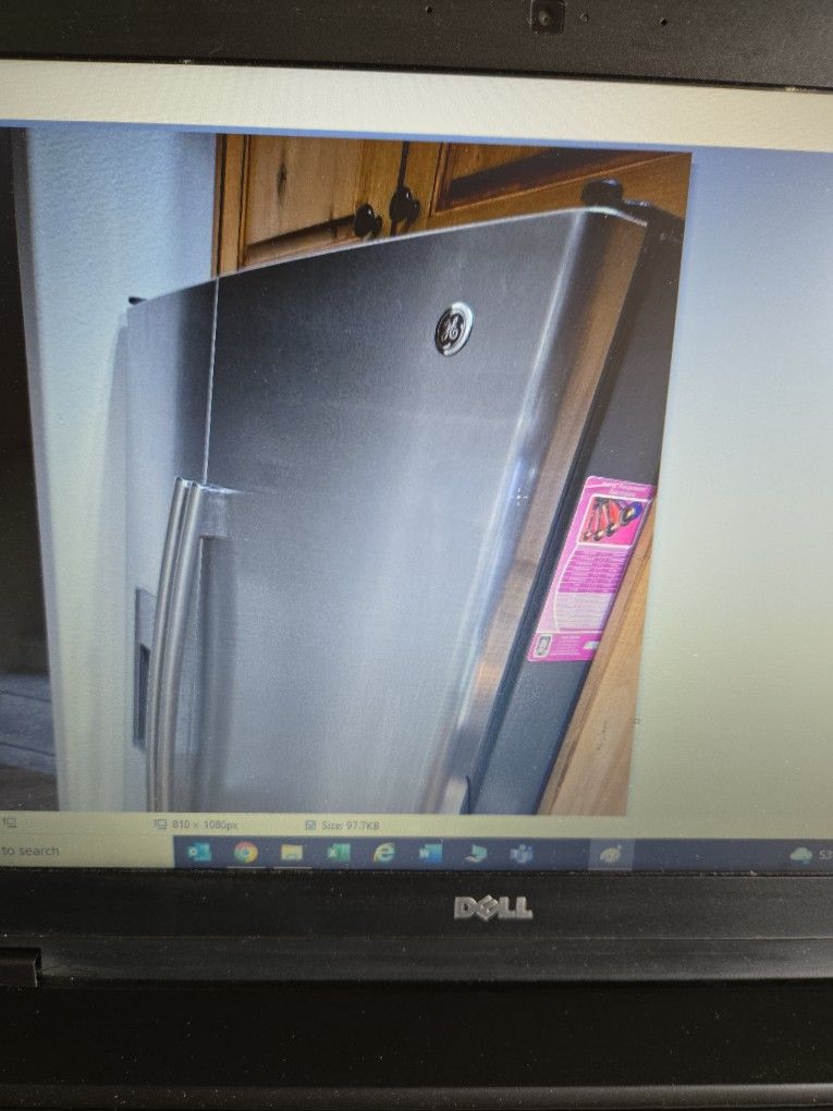 E side by side refrigerator available May 28 deposit will hold