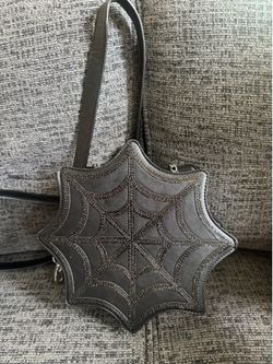 Sour puss spider web purse