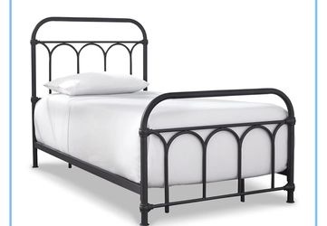 Black twin metal bed