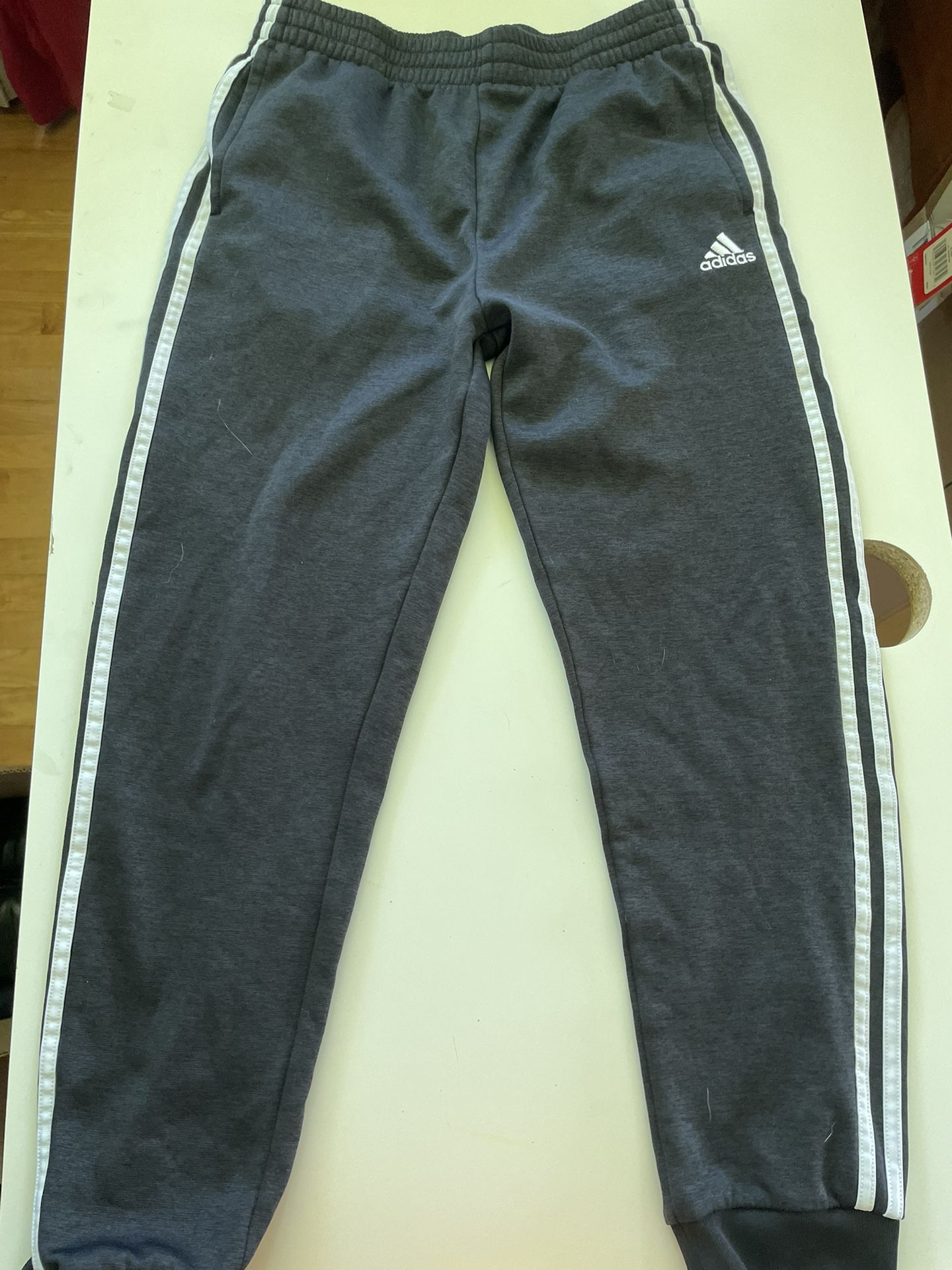 Grey Adidas joggers with white stripes #AdidasJoggers Size: XL (18-20) 🚚 Ships fast – usually same or next day 🔥 Bundle & save – DM for deals on 2+
