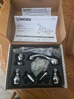 Moen Monticello chrome 4 inch bathroom faucet and valve set