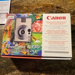 Canon Power shot Camera With All Attachment And Battery