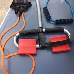 Vintage Exercise Equipment Set with Resistance Bands and Spring Bar