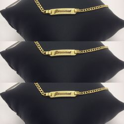Gold ID bracelets that we can engrave.