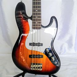 NEW IN BOX! Fender Jazz / J-Bass (Copy) Electric Bass Guitar with a Classic Sunburst Finish