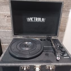 Victrola brand portable suitcase-style record player
